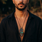 Handmade Obsidian and Malachite statement pendant necklace featuring contrasting black and green gemstones in a bold, one-of-a-kind crystal amulet design.