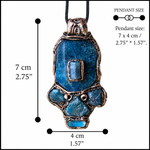 Handmade Blue Apatite pendant necklace combining raw and polished blue gemstones with contrasting textures in an ornate antique bronze-tone polymer clay setting on a black cord.