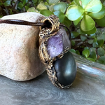 Shungite and raw Amethyst pendant necklace with genuine natural gemstones, handcrafted empath protection crystal amulet for grounding and intuition.