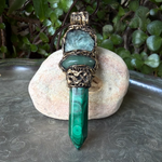Malachite, Green Aventurine and Fluorite pendant necklace with green gemstones and crystal point in a handcrafted sculptural setting.
