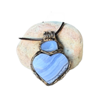 Heart stone pendant necklace with natural Blue Lace Agate and Chalcedony stones, handcrafted healing crystal amulet in soft blue tones.