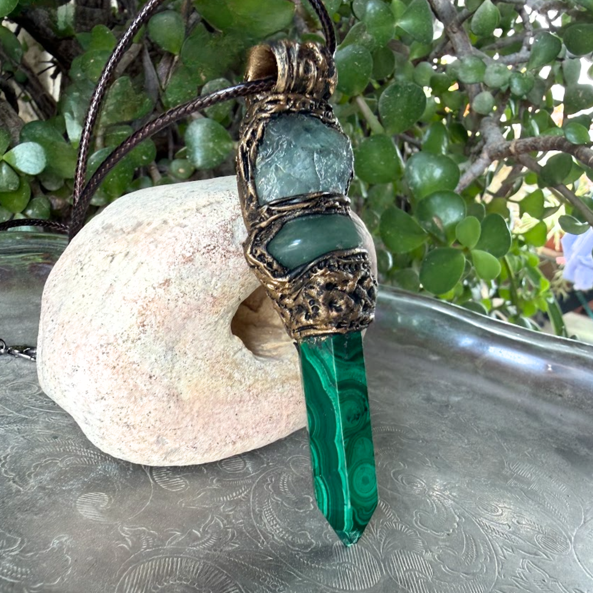 Malachite, Green Aventurine and Fluorite pendant necklace with green gemstones and crystal point in a handcrafted sculptural setting.