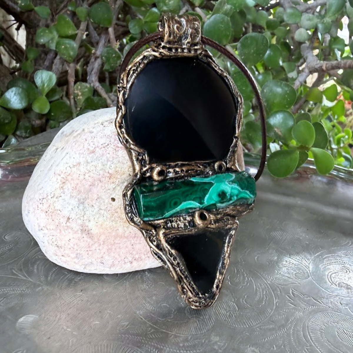Handmade Obsidian and Malachite statement pendant necklace featuring contrasting black and green gemstones in a bold, one-of-a-kind crystal amulet design.
