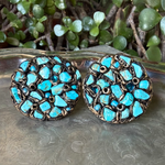 Oversized turquoise cluster round clip-on statement earrings.