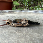 Tiger’s Eye and Obsidian arrow pendant necklace, protective healing crystal amulet.
