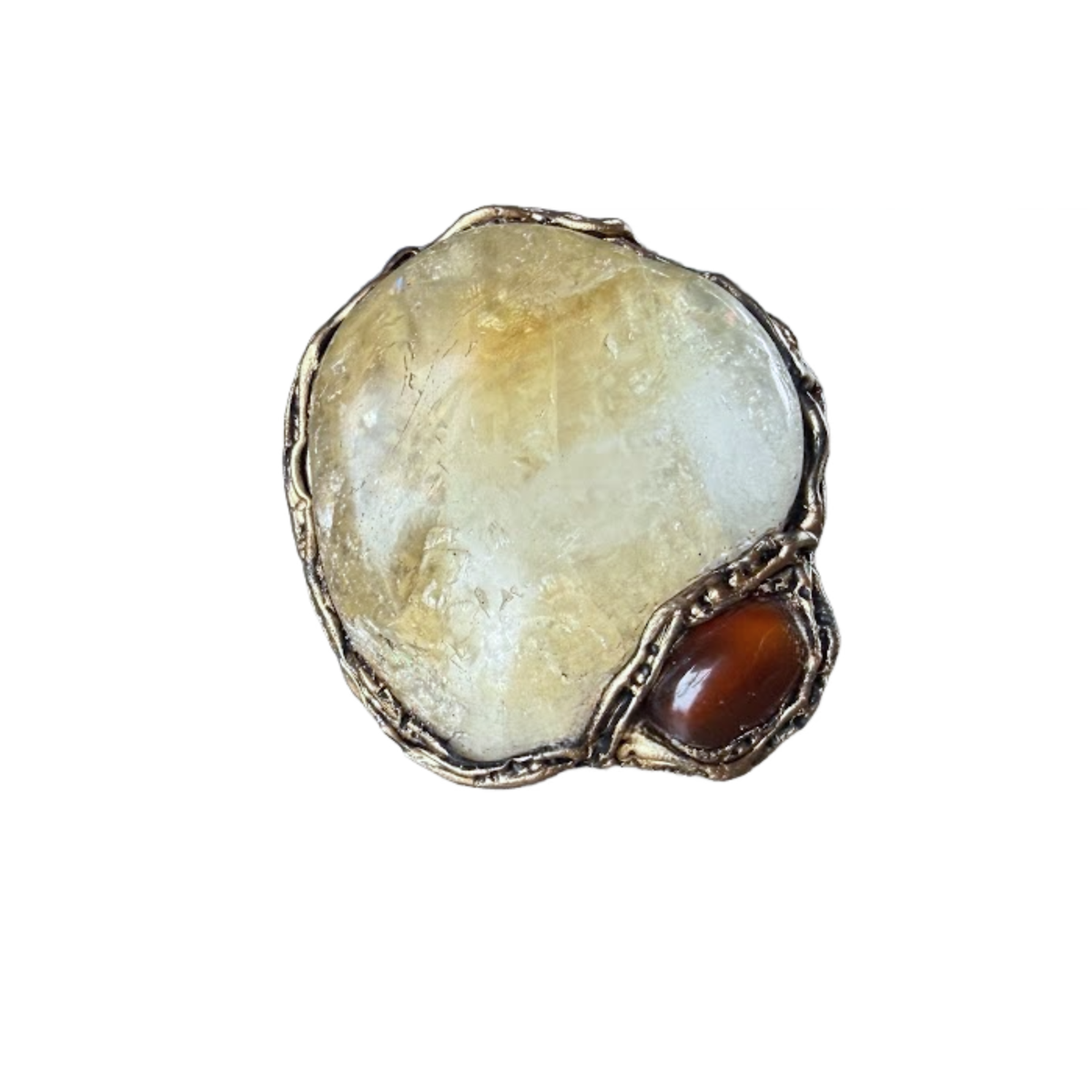Oversized Citrine and Carnelian statement ring with a large pale yellow natural crystal and smaller reddish-brown stone in a sculptural setting.