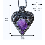 Sculptural heart pendant necklace with central purple Amethyst, dark textured setting and polished Hematite stones.