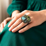Oversized Serpentine, Fluorite and Green Aventurine statement ring with natural green stones in a handcrafted sculptural setting.