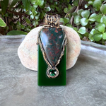 Large Bloodstone and green Jade pendant necklace with natural red-speckled Bloodstone in a handcrafted sculptural setting.