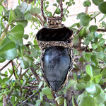 Large Tourmalinated Quartz and Black Onyx pendant necklace with black and translucent natural stones in a handcrafted sculptural setting.