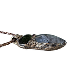 Large Tourmalinated Quartz and Black Onyx pendant necklace with black and translucent natural stones in a handcrafted sculptural setting.