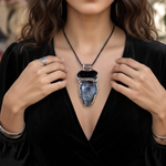 Large Tourmalinated Quartz and Black Onyx pendant necklace with black and translucent natural stones in a handcrafted sculptural setting.