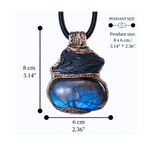 Large Labradorite and Black Kyanite pendant choker worn on a model, featuring raw black crystal above a polished blue-flash Labradorite in an ornate bronze-tone setting.