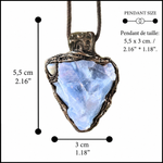 Raw Blue Calcite pendant necklace with a large natural pale blue crystal in a handcrafted sculptural setting.