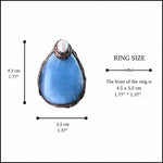 Oversized aquamarine and pearl teardrop cocktail ring, light blue statement gemstone jewelry.