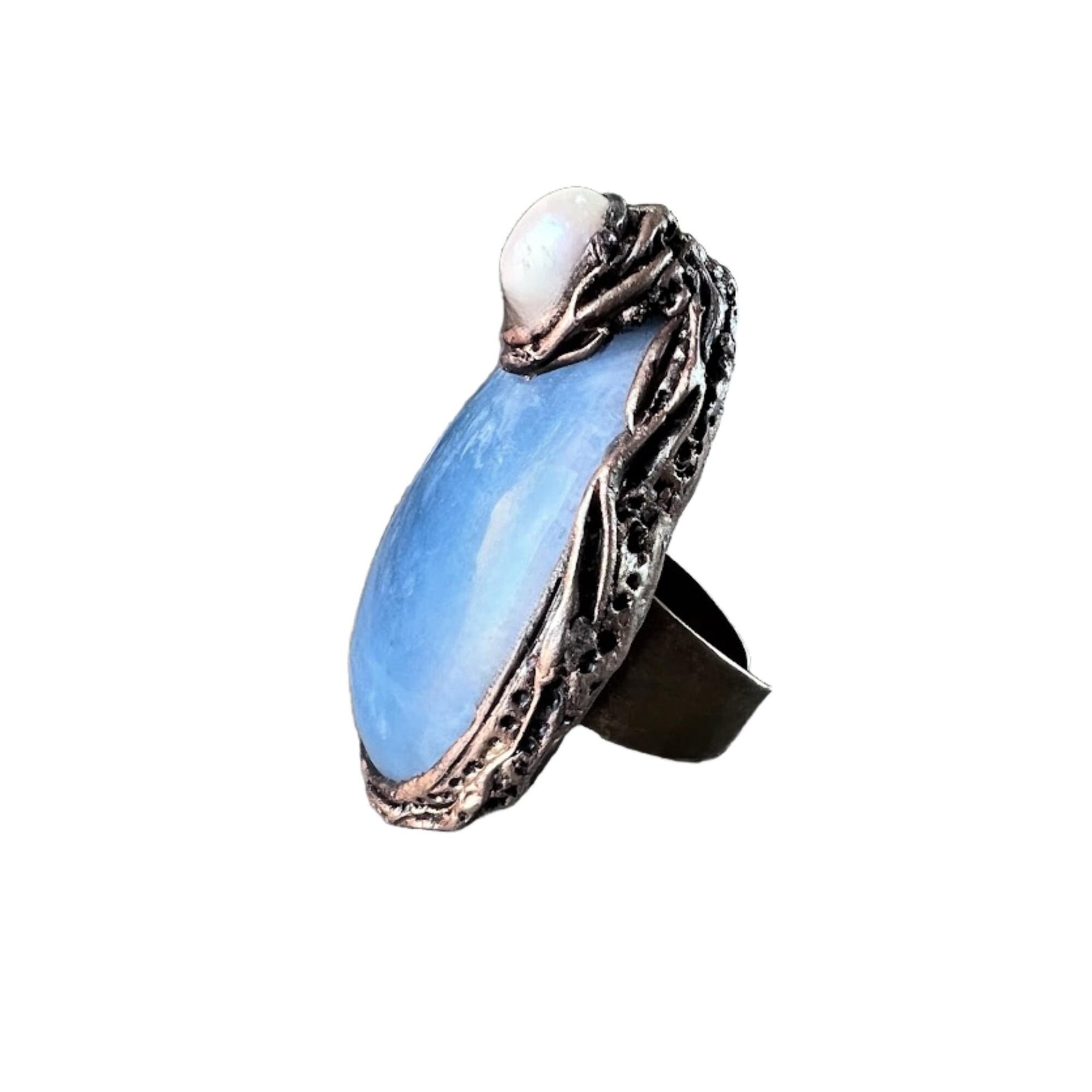 Oversized aquamarine and pearl teardrop cocktail ring, light blue statement gemstone jewelry.