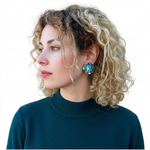 Turquoise cluster statement stud earrings with multiple natural blue-green stones, handcrafted one-of-a-kind gemstone jewelry.